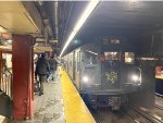 Southbound late morning NYCTA Holiday Train stopped at 34th St-Herald Square Station 